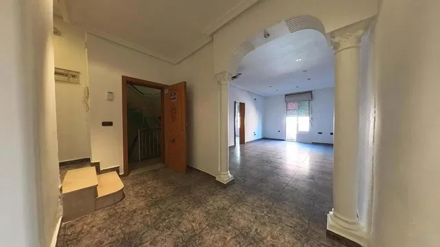 Obývací pokoj; dlažba, přirozené světlo