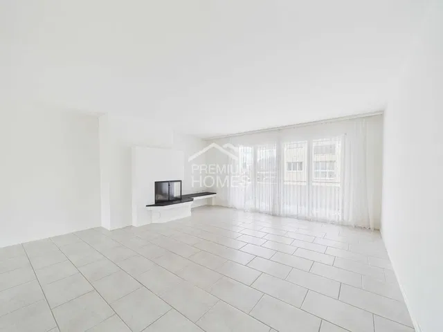 Living room; tile floor, natural light, renovated