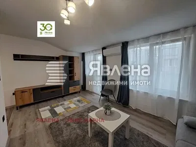 Soggiorno; vista, pavimento in legno, luce naturale, stile moderno