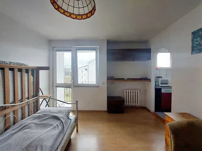 Slaapkamer; natuurlijk licht, houten vloer