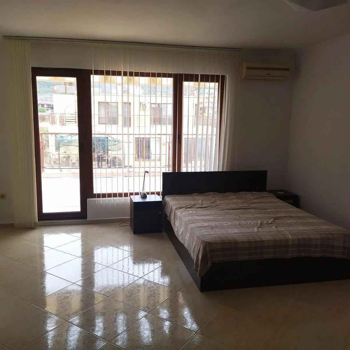 Bedroom; tile floor, natural light, view