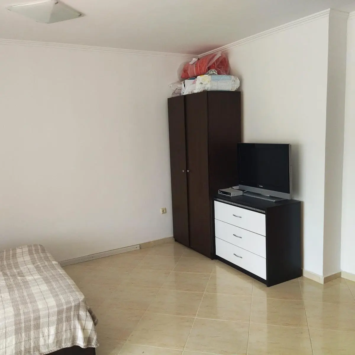 Bedroom; tile floor, natural light