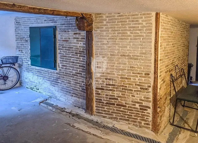 Cellar; wood beams, needs renovation