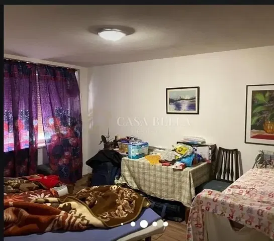 Bedroom; needs renovation, natural light