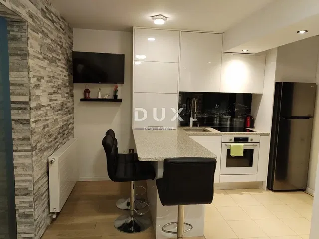 Kitchen; kitchen appliances, tile floor, renovated, modern style