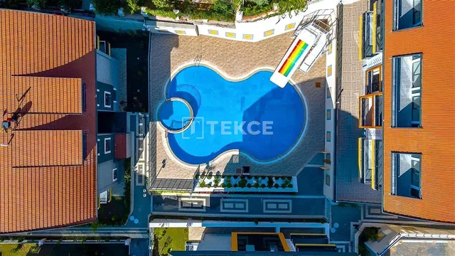 House and surroundings; view