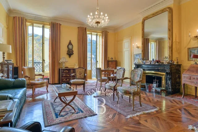 Living room; fireplace, high ceiling, wood floor, natural light, rustic style, view