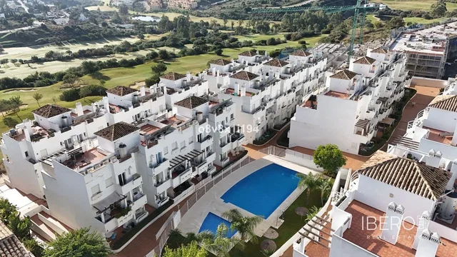 House and surroundings; view