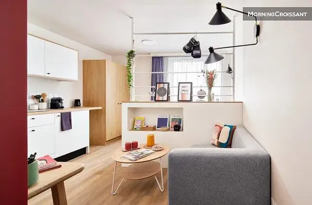 Living room; kitchen appliances, natural light, modern style, wood floor