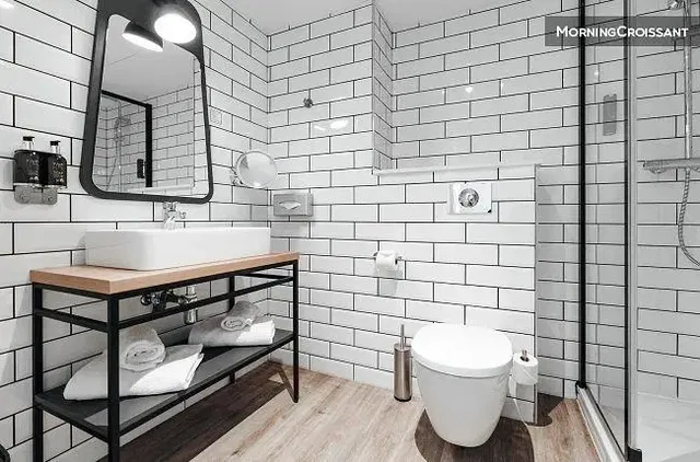 Bathroom; tile floor, renovated, natural light, modern style