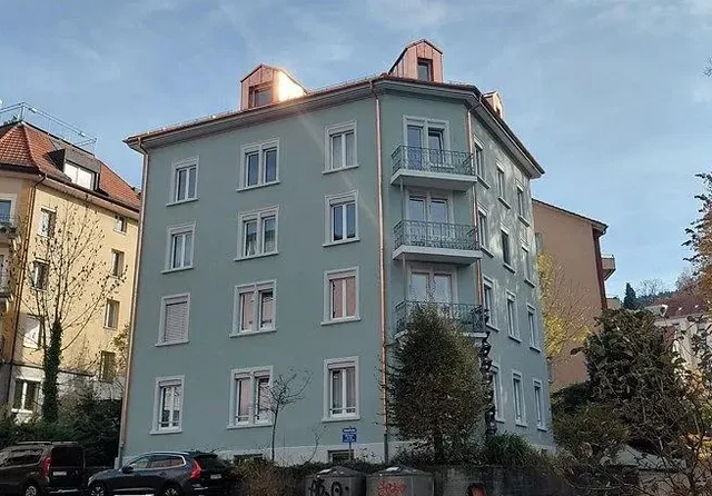 House and surroundings; view