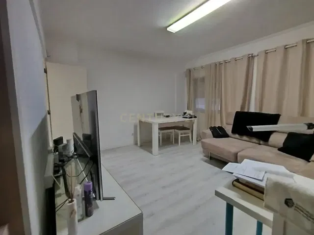 Living room; tile floor, natural light, modern style