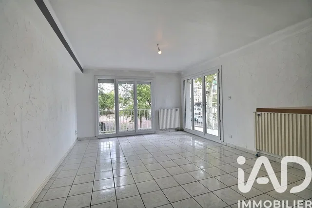 Living room; tile floor, view, needs renovation
