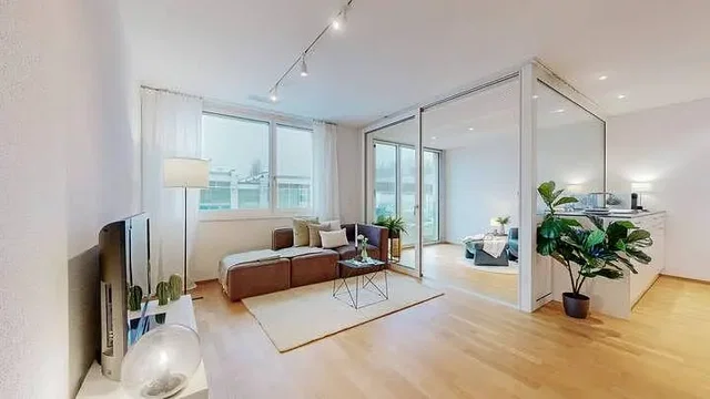Obývací pokoj; přirozené světlo, dřevěná podlaha, moderní styl
