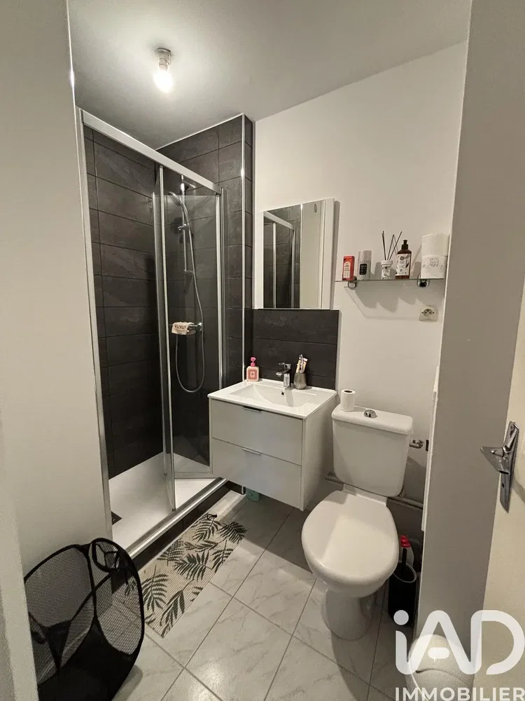 Bathroom; tile floor, renovated, natural light, modern style