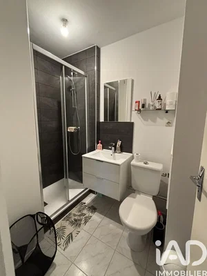 Bathroom; tile floor, renovated, natural light, modern style