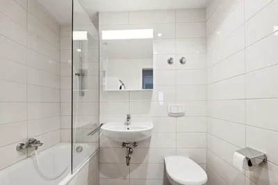 Bathroom; tile floor, renovated, natural light, modern style