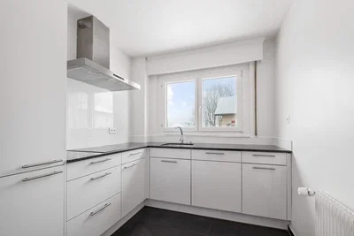 Kitchen; kitchen appliances, natural light, modern style, tile floor