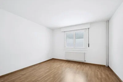 Bedroom; wood floor, natural light