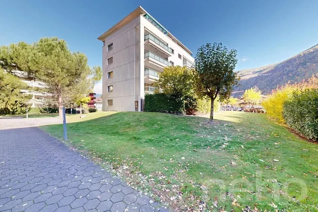 House and surroundings; view