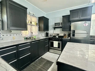 Kitchen; kitchen appliances, tile floor, natural light, modern style