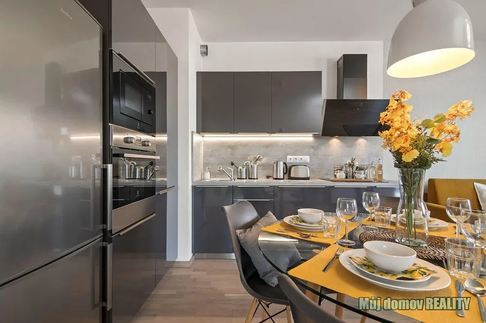 Kitchen; kitchen appliances, modern style, natural light, renovated