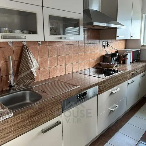 Kitchen; kitchen appliances, tile floor, renovated, natural light, modern style