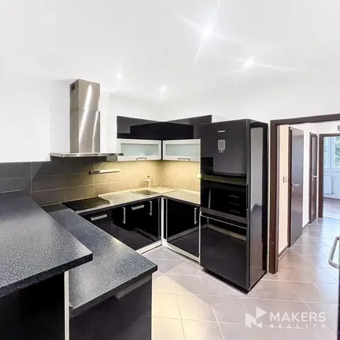 Kitchen; kitchen appliances, tile floor, renovated, natural light, modern style