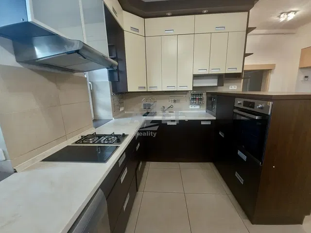 Kitchen; kitchen appliances, renovated, tile floor, natural light, modern style
