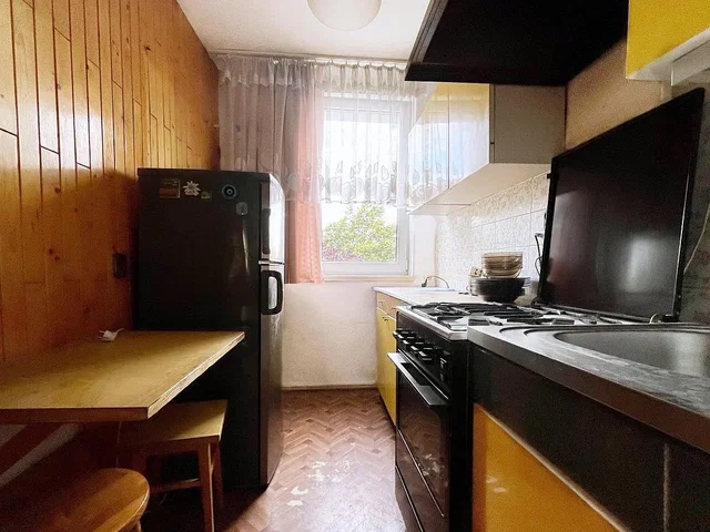 Kitchen; kitchen appliances, natural light, rustic style, wood floor