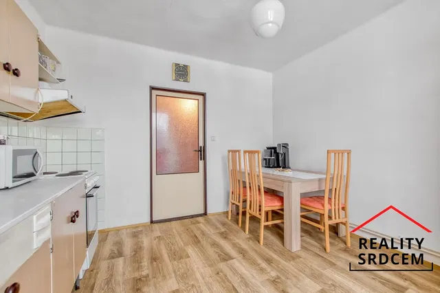 Kitchen; kitchen appliances, tile floor, wood floor