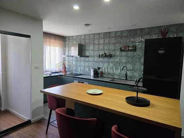 Kitchen; kitchen appliances, tile floor, wood floor, natural light