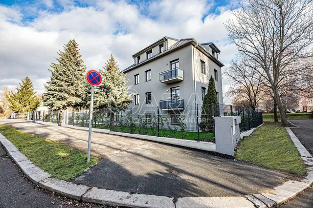 House and surroundings; view