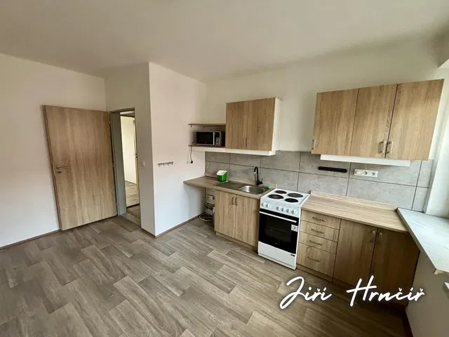 Kitchen; kitchen appliances, tile floor, renovated, natural light