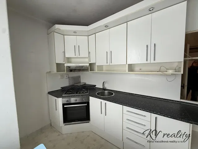 Kitchen; kitchen appliances, tile floor, renovated, natural light, modern style