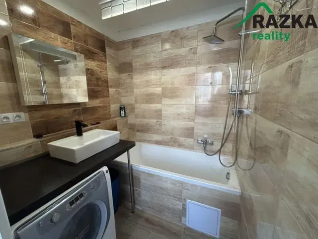 Bathroom; tile floor, renovated, natural light, modern style