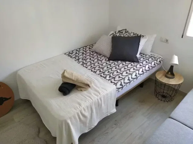 Bedroom; wood floor, natural light