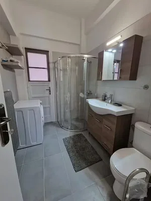 Salle de bain; carrelage, lumière naturelle, rénové