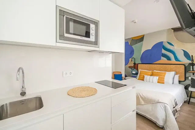 Bedroom; kitchen appliances, natural light