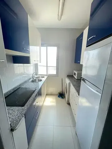 Kitchen; kitchen appliances, natural light, modern style, tile floor