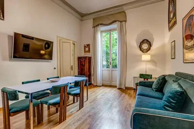 Soggiorno; pavimento in legno, luce naturale, stile moderno