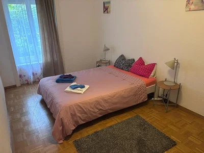 Bedroom; wood floor, natural light