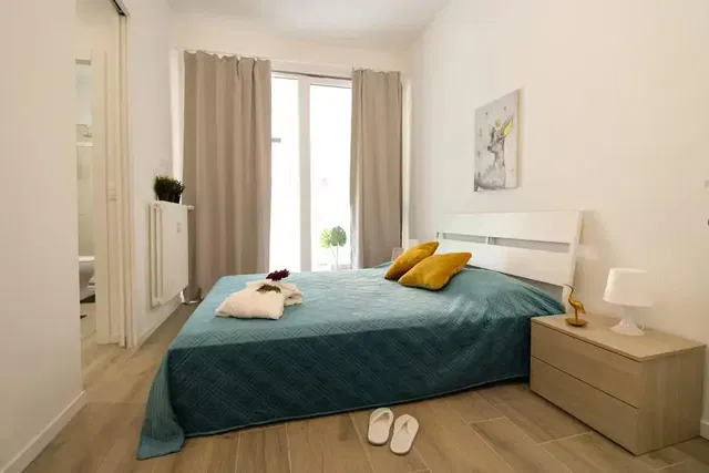 Bedroom; natural light, wood floor