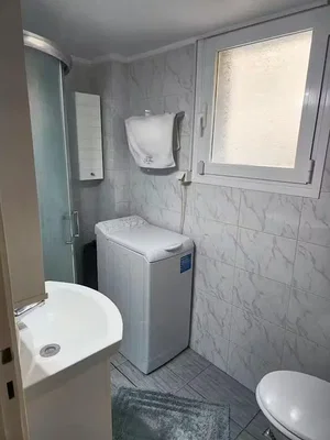 Salle de bain; carrelage, lumière naturelle, rénové