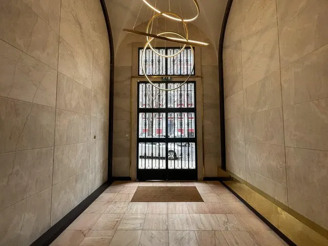 Cloakroom; tile floor, high ceiling