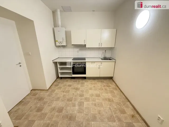 Kitchen; tile floor, kitchen appliances, water heater