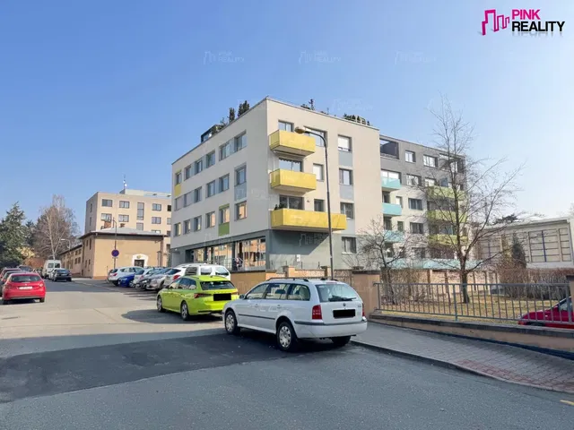 House and surroundings; view
