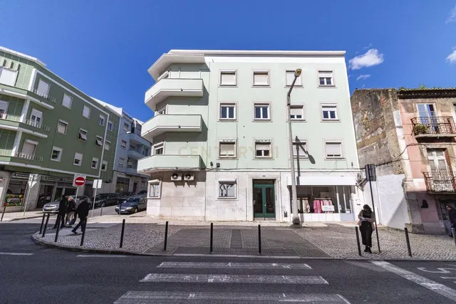 House and surroundings; view