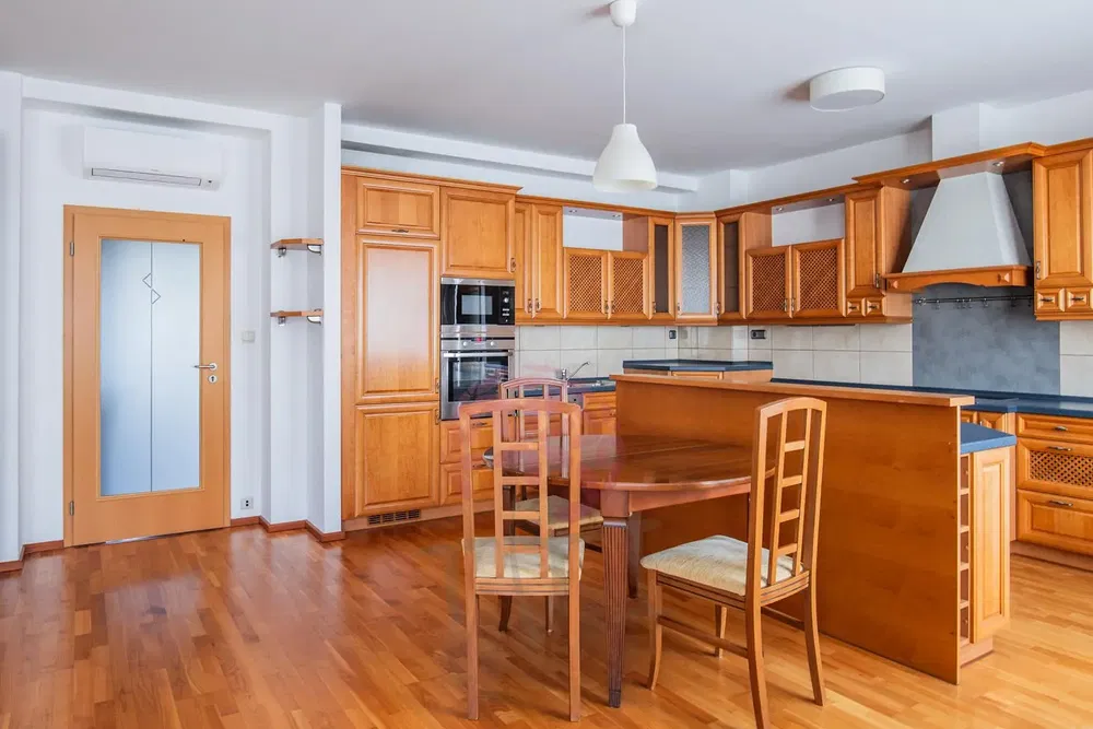 Kitchen; kitchen appliances, wood floor, natural light, modern style