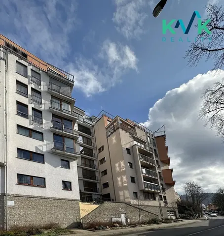 House and surroundings; view